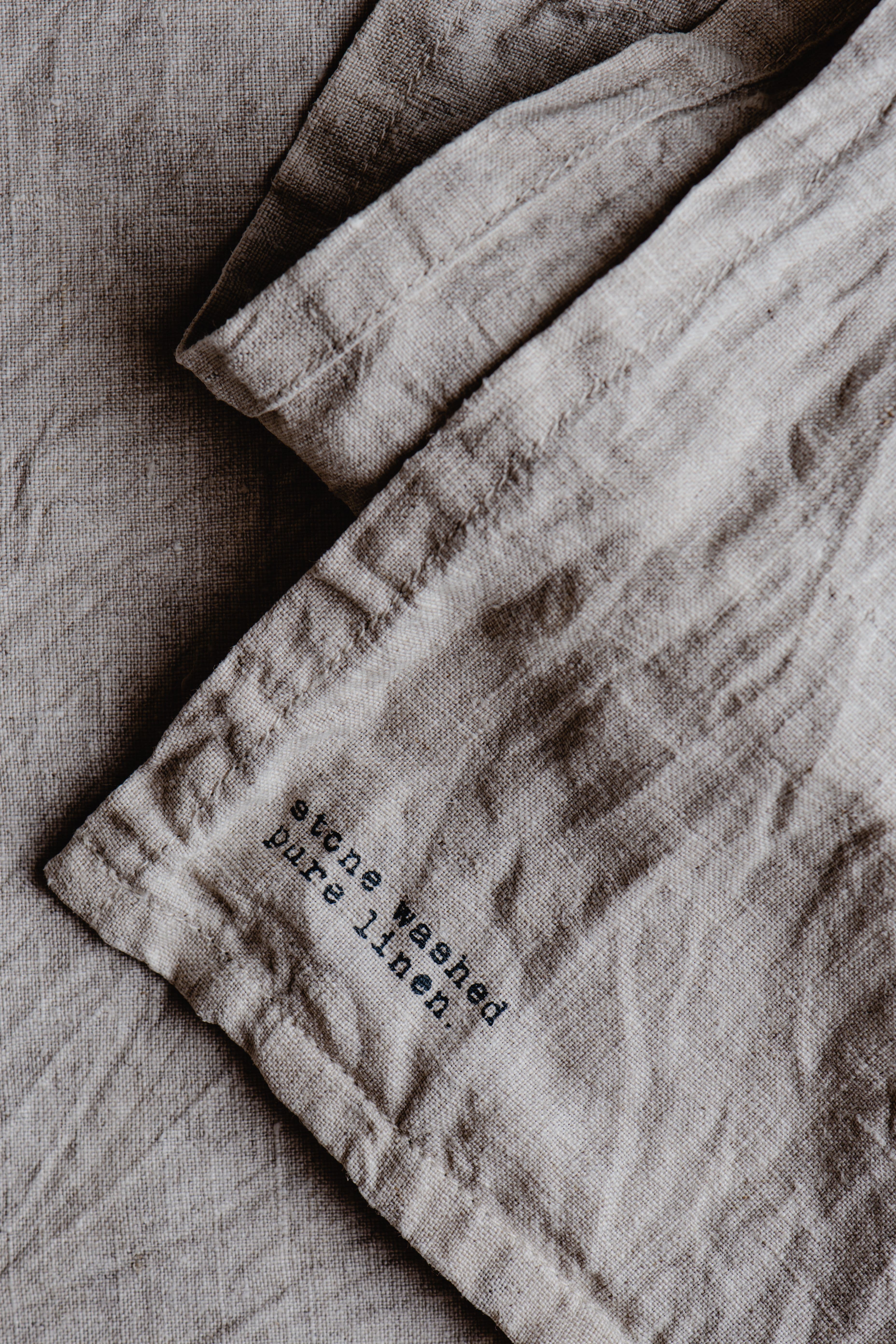 Close-up detail of linen weave showing texture and irregular fibre