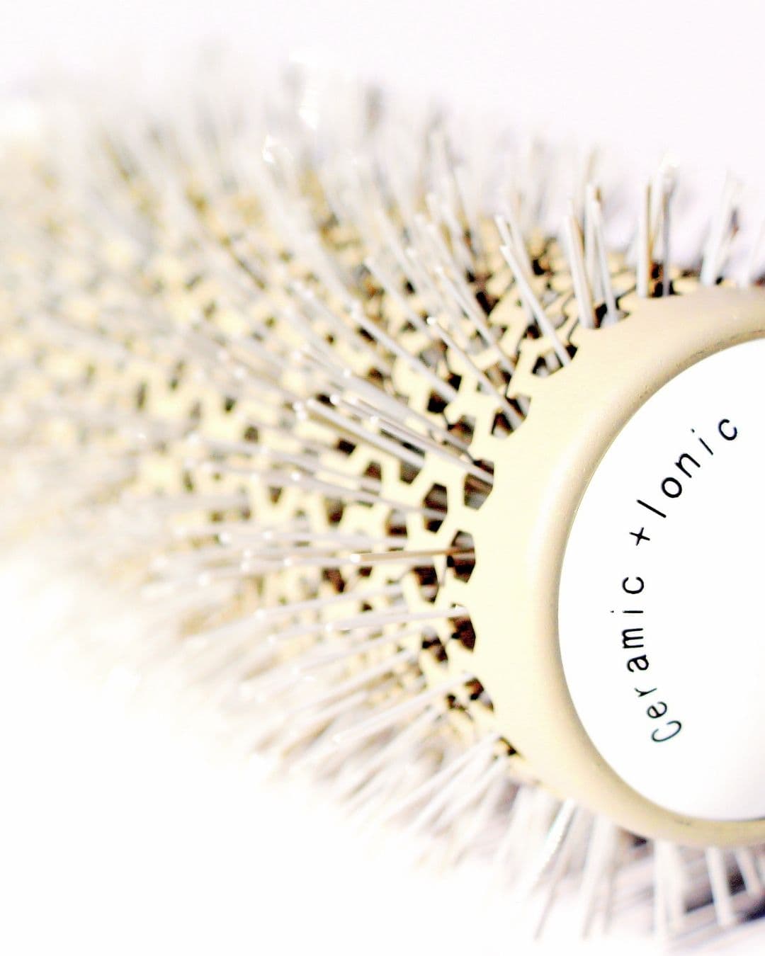 Close detail of the bristles and handle of a well-made hairbrush